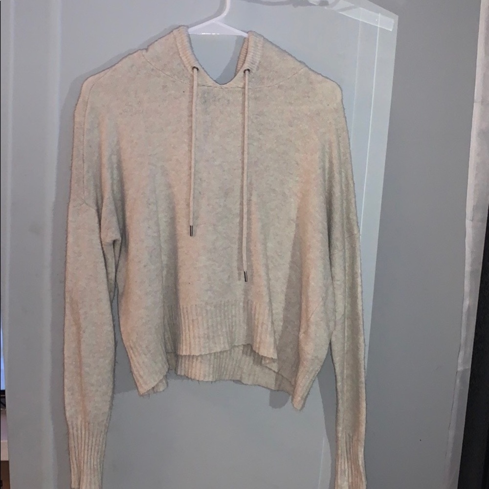 tan sweater